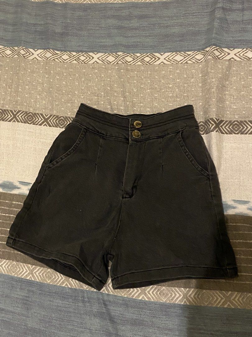 Black High Waisted Shorts Size S (Category: Shorts) located in Tanauan. Submitted by rie098 (Listing ID 1453734117, Image 1). Description: - Color: Black - Style: High-waisted shorts - Closure: Button and zip front - Pockets: Two front pockets - Occasion: Casual wear - Features: Simple and classic design.