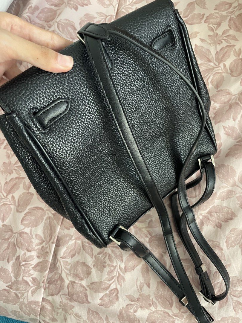 Black Leather Backpack with Silver Clasp (Category: Backpacks) located in Paranaque City. Submitted by reeseerz (Listing ID 1453626029, Image 2). Description: Bought from Macao Used twice Dimensions: length - 9 inches, width - 8.5 inches RFS: Decluttering Payment: GCash.