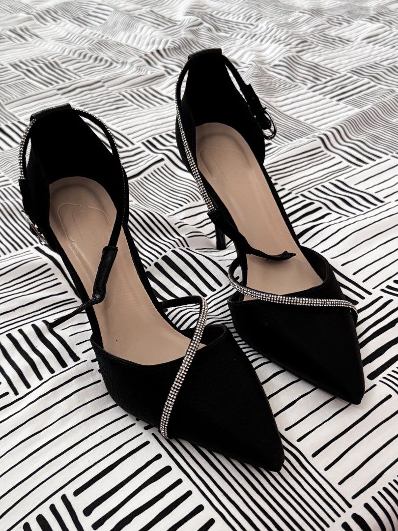 Black Pointed Toe Heels with Ankle Strap and Rhinestones (Category: Heels) located in Capas. Submitted by secondsbya_ (Listing ID 1453625085, Image 3). Description: - Cute black heels - Size EUR36 - Pointed toe design - Delicate ankle strap with sparkly rhinestones - Rhinestones also across the toe - Moderate heel height - Perfect for dressing up any outfit.