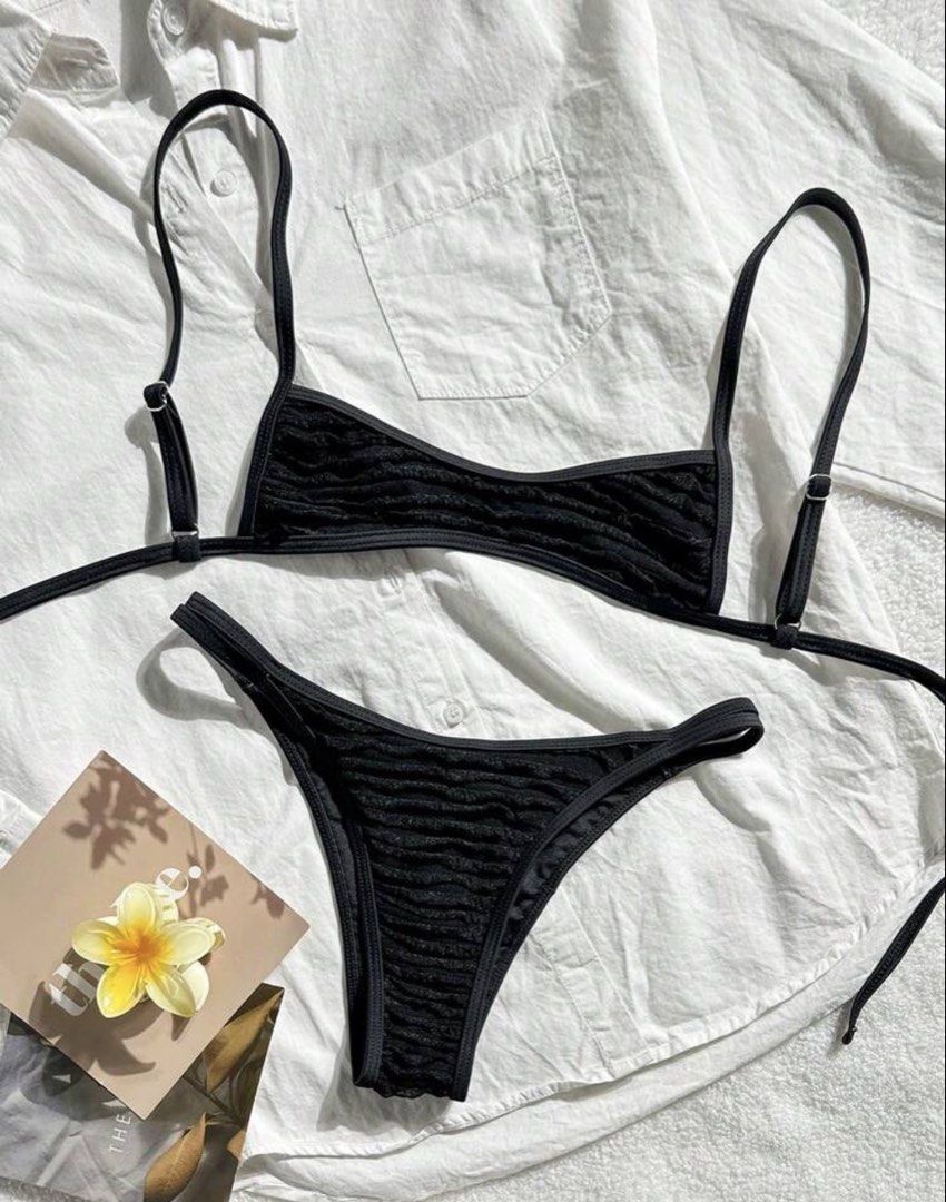 Black Textured Bikini Set (Category: Bikinis & Swimsuits) located in Makati City. Submitted by _fitz (Listing ID 1453677805, Image 1). Description: - Textured fabric on top and bottom - Adjustable straps on bikini top - Thong-style bottoms.