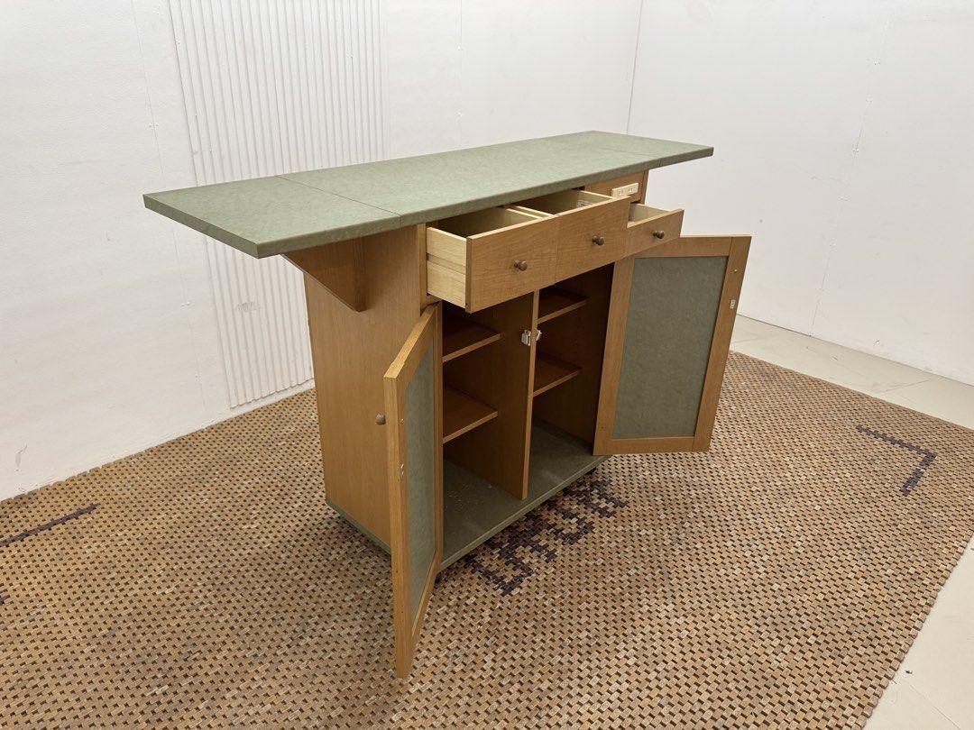 Buffet Table (Category: Tables & Sets) located in Quezon City. Submitted by matetdevis13 (Listing ID 1453748166, Image 3). Description: Vintage Cocktail / Buffet Bar Rolling Cabinet with Expandable Table Top Price: 6,500 L35.5/58.5 x W17.5 x H39 In good condition Code JMD35-G414.