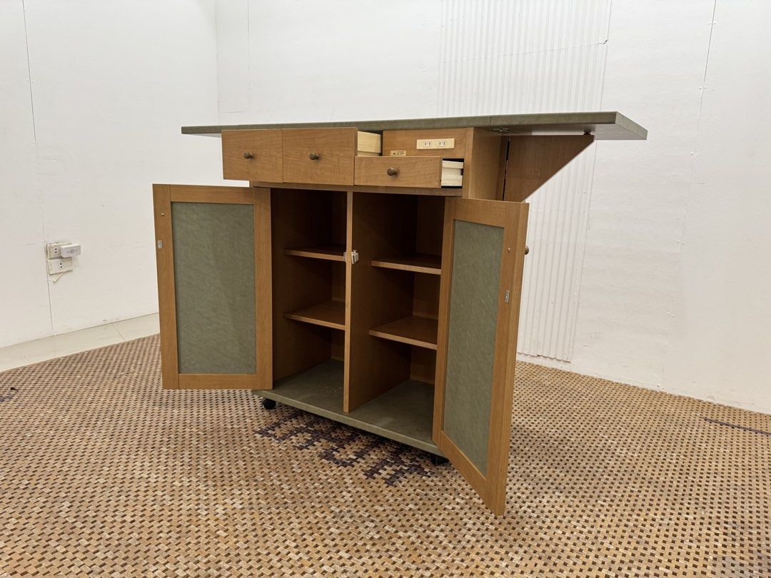 Buffet Table (Category: Tables & Sets) located in Quezon City. Submitted by matetdevis13 (Listing ID 1453748166, Image 2). Description: Vintage Cocktail / Buffet Bar Rolling Cabinet with Expandable Table Top Price: 6,500 L35.5/58.5 x W17.5 x H39 In good condition Code JMD35-G414.