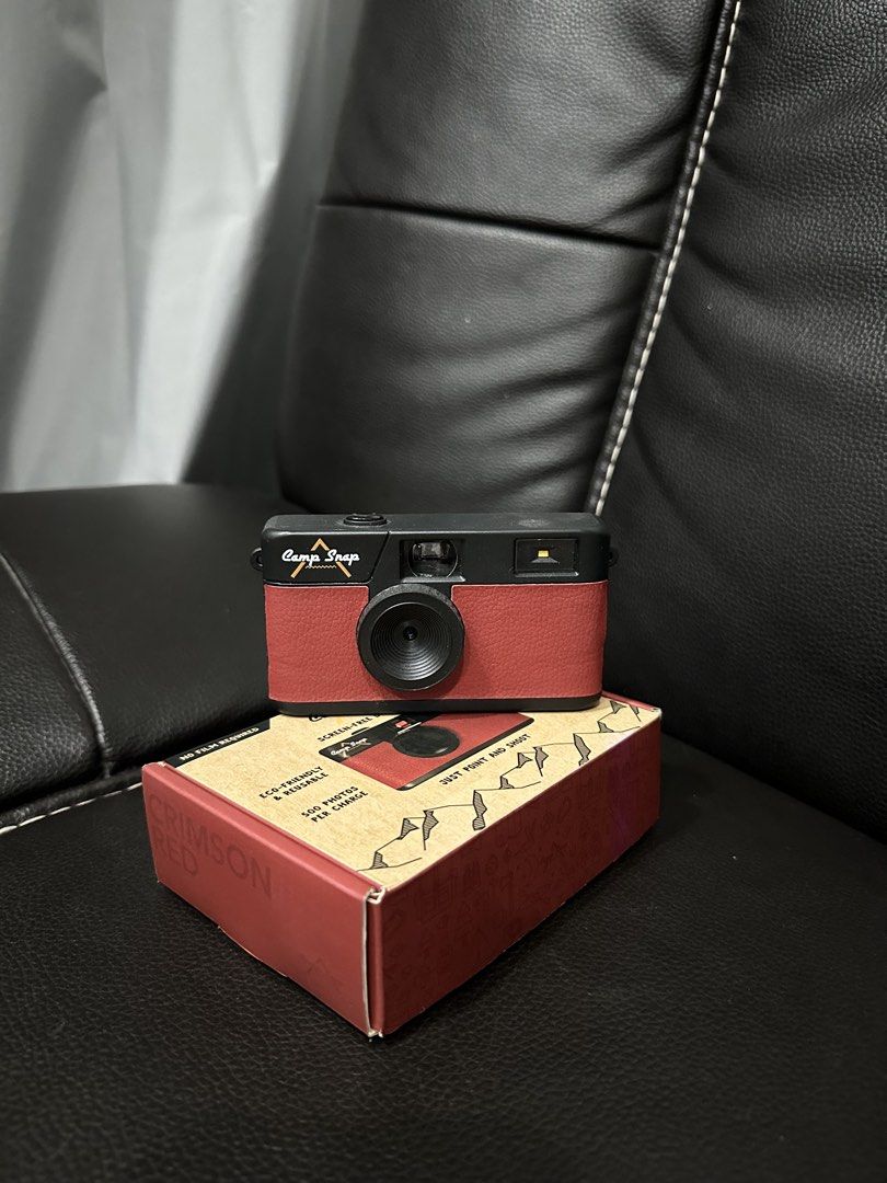 Camp Snap Crimson Red Reusable digital Film Camera (Category: Cameras) located in Bacoor. Submitted by aikaclariz (Listing ID 1453711729, Image 1). Description: - used it twice - reusable film /digital camera in Crimson Red - Comes with original box - Long-lasting battery: 500 photos per charge - Simple point-and-shoot operation - Perfect for casual photography enthusiasts.