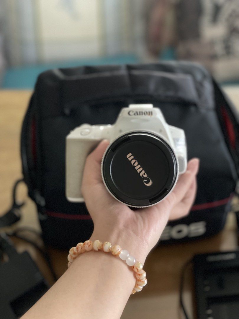 Canon EOS 200d Mark II (Category: Cameras) located in Las Pinas. Submitted by qwertworksy (Listing ID 1453769823, Image 2). Description: ‼️STILL IN SUPER GOOD CONDITION‼️ Only used this camera for events while I was in college and occasional family events. Been taking good care of this camera for 3 years:) This camera is good for anyone looking to start their photography and videography journey Inclusions: Camera body Kit lens Canon(18mm-55mm) OR