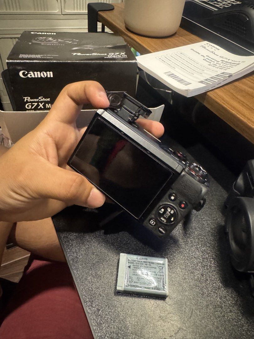 Canon G7X Mark III DigiCam (Category: Cameras) located in Taguig. Submitted by ric1998 (Listing ID 1453626077, Image 2). Description: - Canon PowerShot G7 X Mark III camera - Compact point-and-shoot style - Ideal for travel and everyday photography - Includes original battery - Comes with original box - Manuals included issue: -Minor dents(signs of usage) -Battery lock lever nasa pic ung issue aside from that wala na 100% working padin.