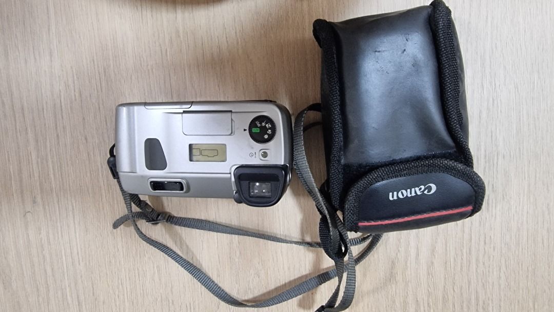 Canon IXUS 70 Digital Camera with Case (Category: Cameras) located in Paranaque City. Submitted by olxph_668280920 (Listing ID 1453808417, Image 2). Description: - Silver Canon IXUS 70 digital camera - Includes original Canon protective case - Attached camera strap - Tested and confirmed working - Ideal for casual, quick snapshots - Ready for its new owner.