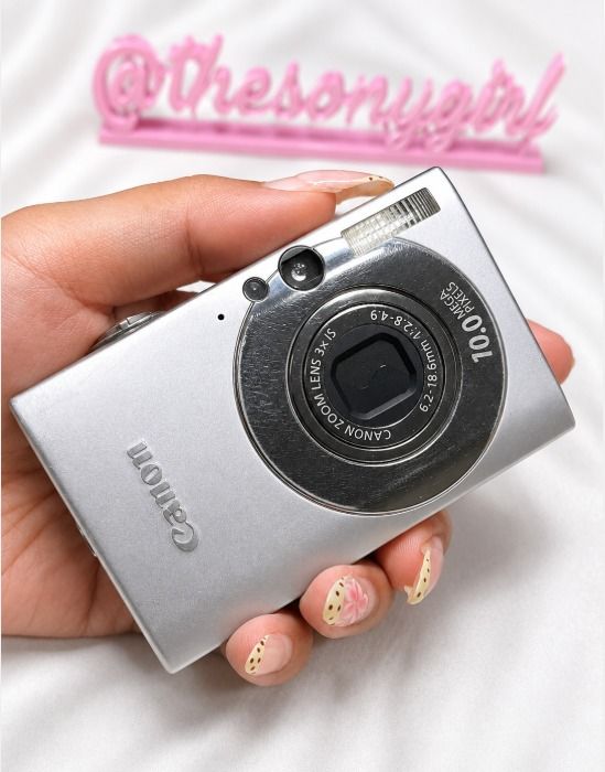 Canon IXUS 85 IS CCD Digital Camera (Category: Cameras) located in Quezon City. Submitted by thesonygirl (Listing ID 1453668334, Image 1). Description: Canon IXUS 85 IS - AVAILABLE⭑.ᐟ PRELOVED Iconic Canon colors & dreamy CCD outputs Beginner friendly Features☆ ✦︎ 10.0 megapixels CCD sensor for the classic digicam look ✦︎ 3X optical zoom (35–105mm equivalent) ✦︎ Optical Image Stabilizer (IS) for sharper handheld shots ✦︎ 3.0-inch LCD screen ✦︎ Fa