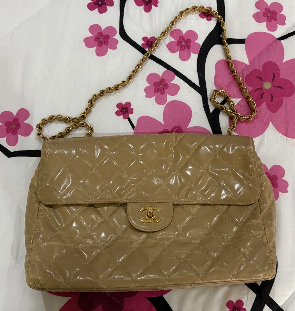 Chanel Classic Flap Bag Beige Leather (Category: Luxury Bags & Wallets) located in Manila. Submitted by adp2021 (Listing ID 1453695037, Image 1). Description: - Authentic Vintage Chanel Bag - Color: Beige - Style: Classic Flap - Hardware: 24 k Gold plated - Intact Holo -Good Condition - Guaranteed Authentic - Unretouched - Hardware Excellent Condition - Jumbo/Large Size SERIOUS BUYERS ONLY!.