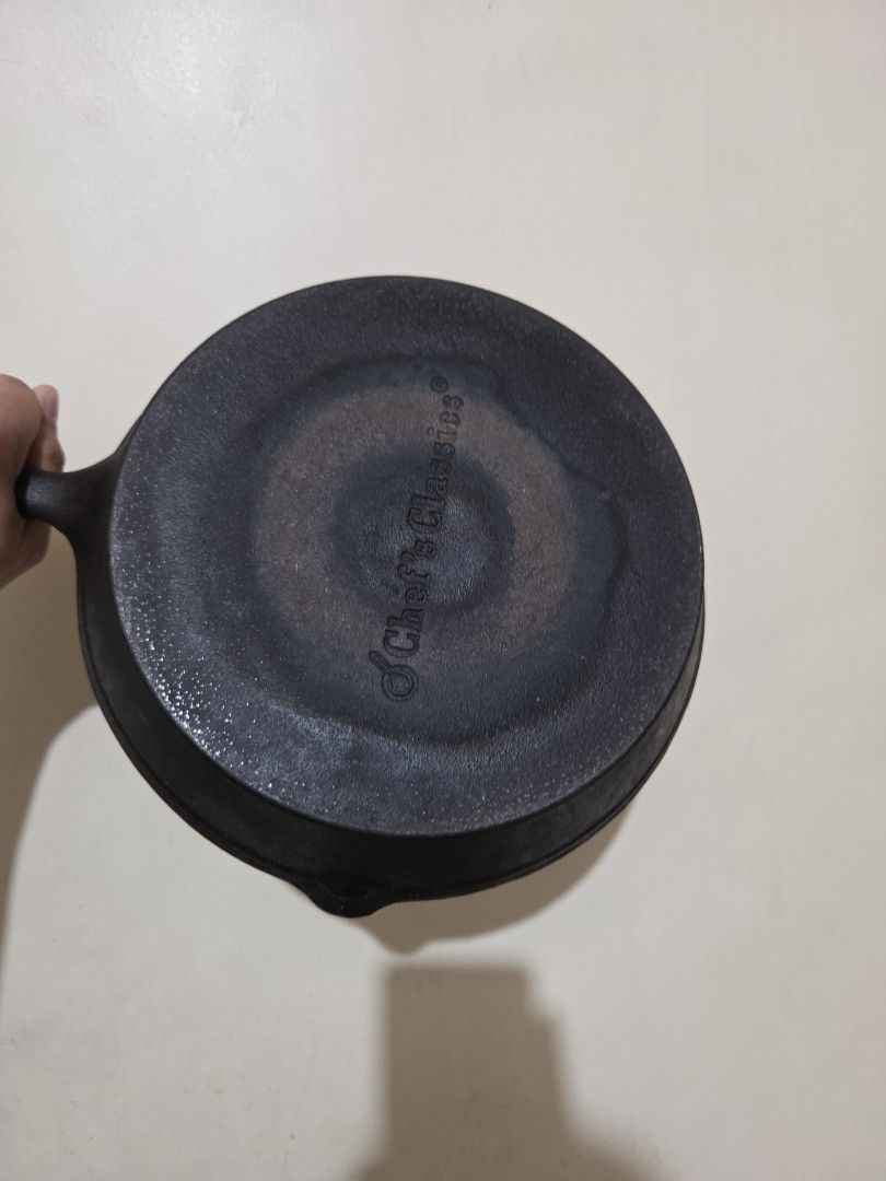 Chef's Classics Cast Iron Frypan 25cm (Category: Cookware & Accessories) located in Pasig City. Submitted by wormy (Listing ID 1453800311, Image 3). Description: - Brand: Chef's Classics - Type: Cast Iron Frypan - Size: 25cm - Material: Durable Cast Iron - Features: Even heat distribution, versatile for various cooking methods. - No rust but might need reseasoning.