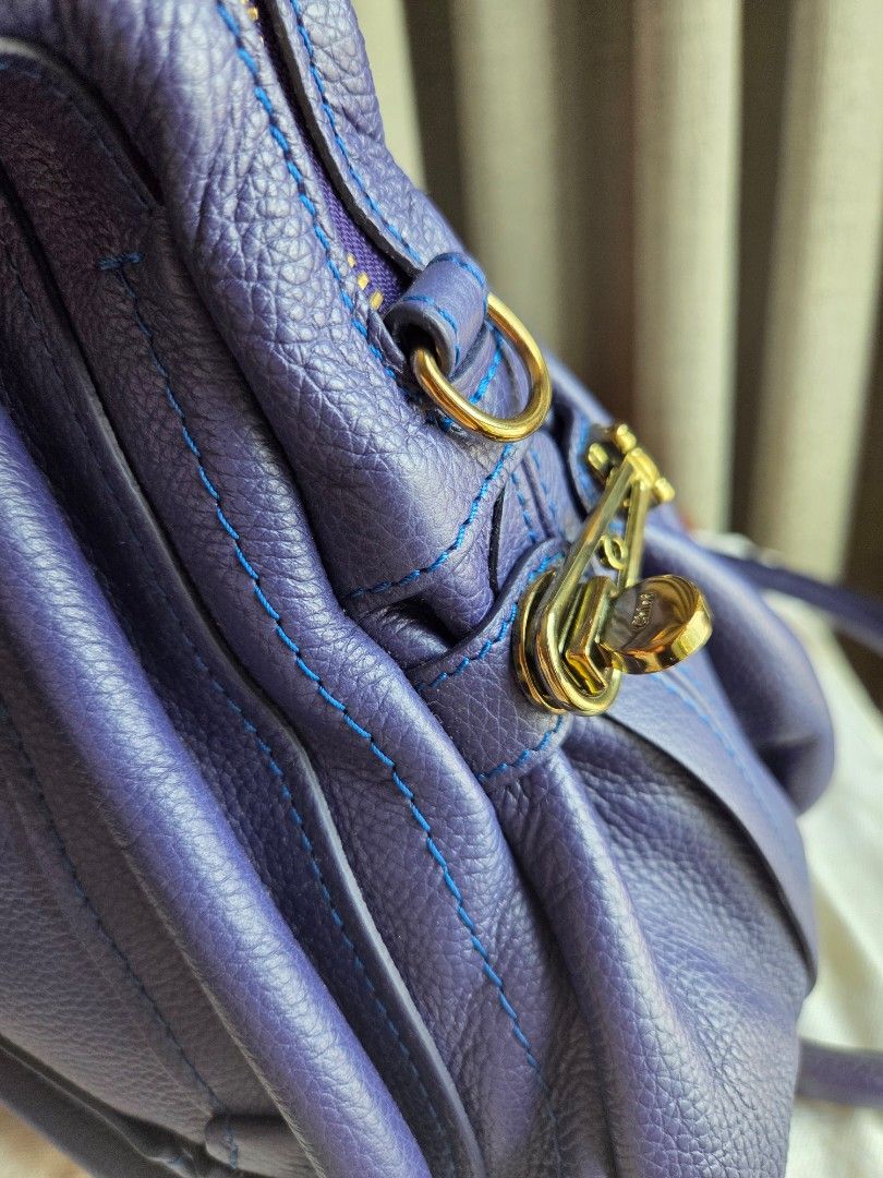 Chloe Paraty Storm Blue (Category: Luxury Bags & Wallets) located in Quezon City. Submitted by shop.mar.go (Listing ID 1453663727, Image 3). Description: used twice then kept very clean leather, no rubs or signs of usage on the egdes of the bag. interior has slight discoloration due to hardware-lining when kept but barely noticeable. no foul smell. inclusion posted in the 1st photo..