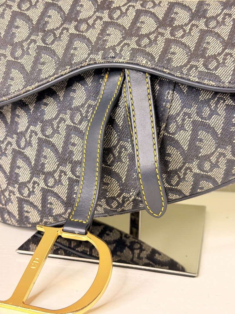 Christian Dior Monogram Navy Saddle Bag (Category: Luxury Bags & Wallets) located in Manila. Submitted by coachmethen (Listing ID 1453807281, Image 2). Description: Condition : AB Inclusion : dustbag Authenticity guaranteed has signs of wear on the hardware and rubs on leather.