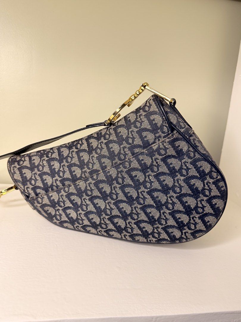 Christian Dior Monogram Navy Saddle Bag (Category: Luxury Bags & Wallets) located in Manila. Submitted by coachmethen (Listing ID 1453807281, Image 3). Description: Condition : AB Inclusion : dustbag Authenticity guaranteed has signs of wear on the hardware and rubs on leather.