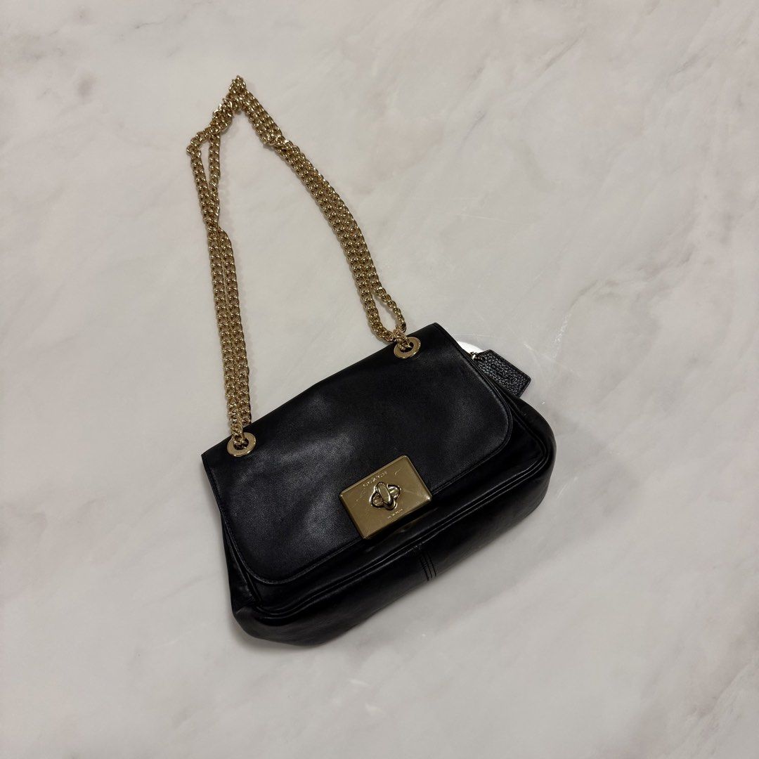 Coach Chain Shoulder Bag (Category: Luxury Bags & Wallets) located in Manila. Submitted by shopsbyncs (Listing ID 1453803440, Image 1). Description: Authentic Coach black leather shoulder bag.