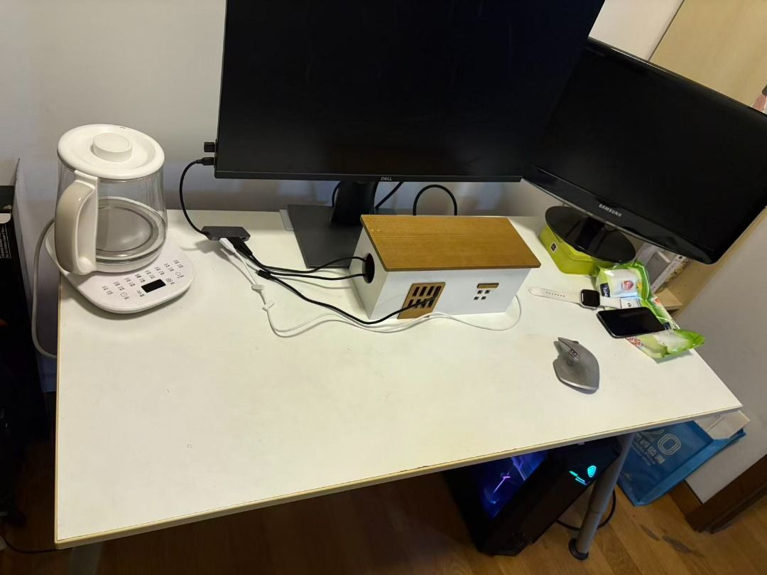 Computer & Study table (Category: Tables & Sets) located in Singapore. Submitted by JamieHudson (Listing ID 1453766991, Image 2). Description: Dimension: height is ~70cm, length is ~120cm, width is ~60cm 1. Spacious white tabletop — comfortably fits dual monitors, mechanical keyboard, mouse, and a full desktop tower underneath 2. Slim metal tube legs — lightweight yet stable, with adjustable feet for uneven flooring 3. Versatile size — works well