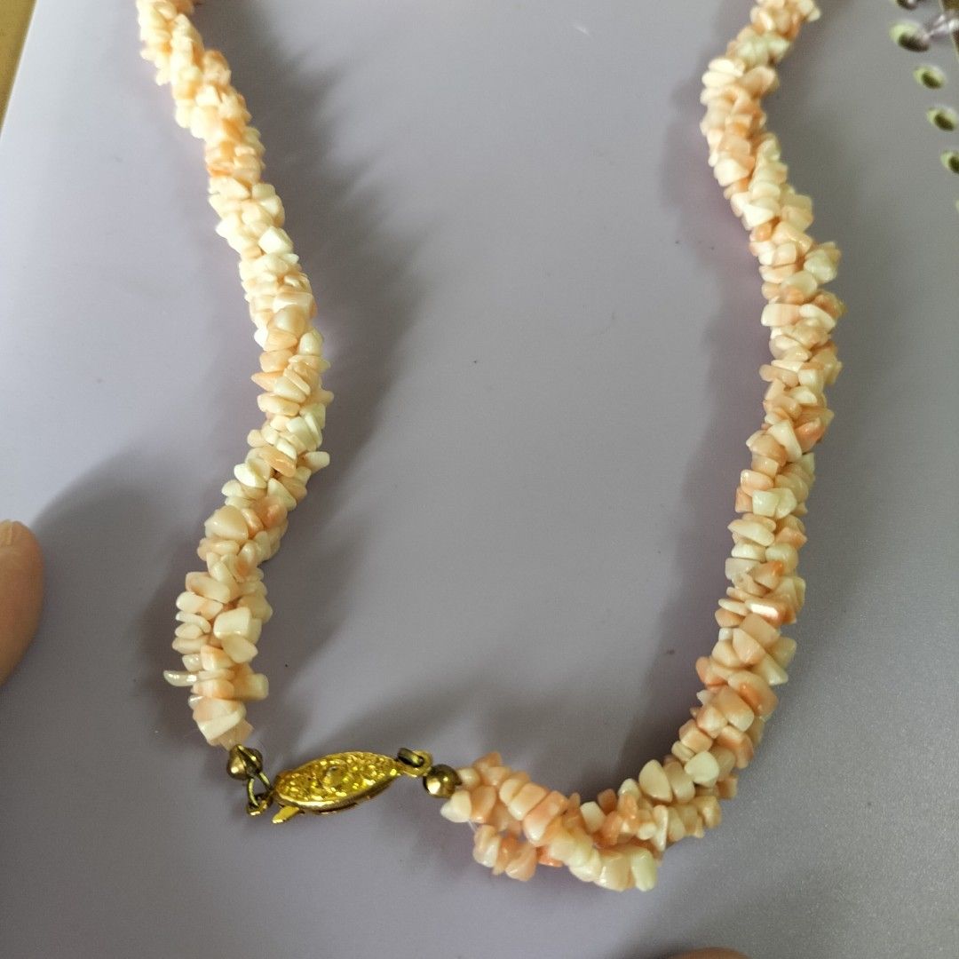 Coral Chip Necklace with Gold Clasp (Category: Necklaces) located in Paranaque City. Submitted by decluttering-all (Listing ID 1453634994, Image 3). Description: - Pretty coral chip necklace - Natural pink and white tones - Unique twisted design - Gold-tone clasp closure - Approx. 18 inches long - Potential set piece, great for adding color! p690 only unused, stored only Get 1 necklace and the bracelet is free Get 2 necklace and get the thin neck