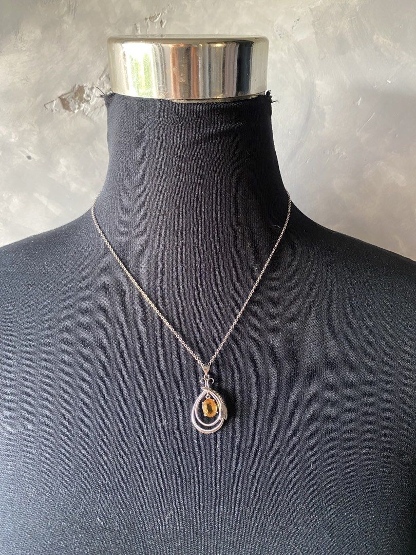 Dainty Citrine Pendant Necklace (Category: Necklaces) located in Cebu City. Submitted by janb85 (Listing ID 1452926483, Image 1). Description: Natural Citrine Teardrop Pendant with Silver marking on the pendant Cute everyday wear .