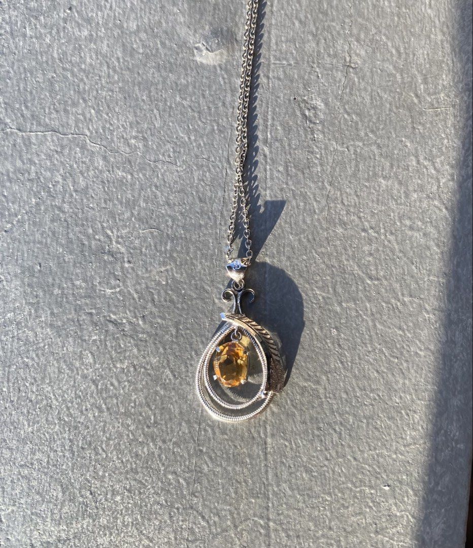 Dainty Citrine Pendant Necklace (Category: Necklaces) located in Cebu City. Submitted by janb85 (Listing ID 1452926483, Image 2). Description: Natural Citrine Teardrop Pendant with Silver marking on the pendant Cute everyday wear .