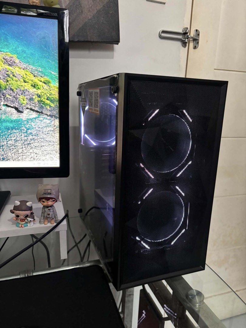 DF Computer Case with Tempered Glass and RGB Fans (Category: Desktops) located in Manila. Submitted by blueshark05 (Listing ID 1453746314, Image 2). Description: SU Specs: AMD Ryzen 5 5600G 6 Cores 12 Threads Processor MSI B450M-A PRO MAX II Motherboard Kingston Fury Beast 16GB 3200Mhz 500 GB SSD Corsair CV 650W 80+ Bronze Good DarkFlash M305 Mesh Case + Keytech Prism x3 Fans With Remote Comes with: - web camera - bluetooth dongle - wifi lan *PRI