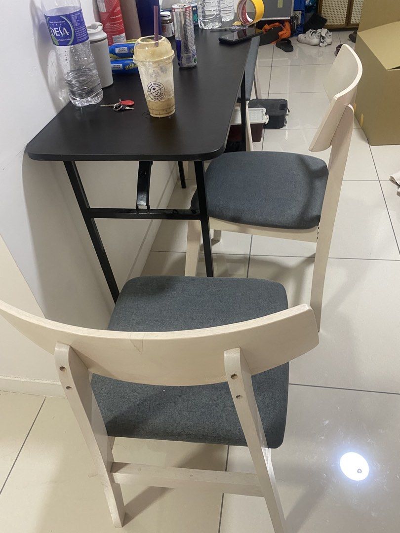Dining table (Category: Tables & Sets) located in Kuala Lumpur. Submitted by hidayatika (Listing ID 1453777783, Image 3). Description: PICKUP ONLY IN WANGSA MAJU by tomorrow! Selling as me moving out.Selling a dining table and 6 seater. The desk has a light wood finish and is spacious enough for work or study. The chairs have wooden frames and dark grey cushioned seats. Great for a home office or study nook..