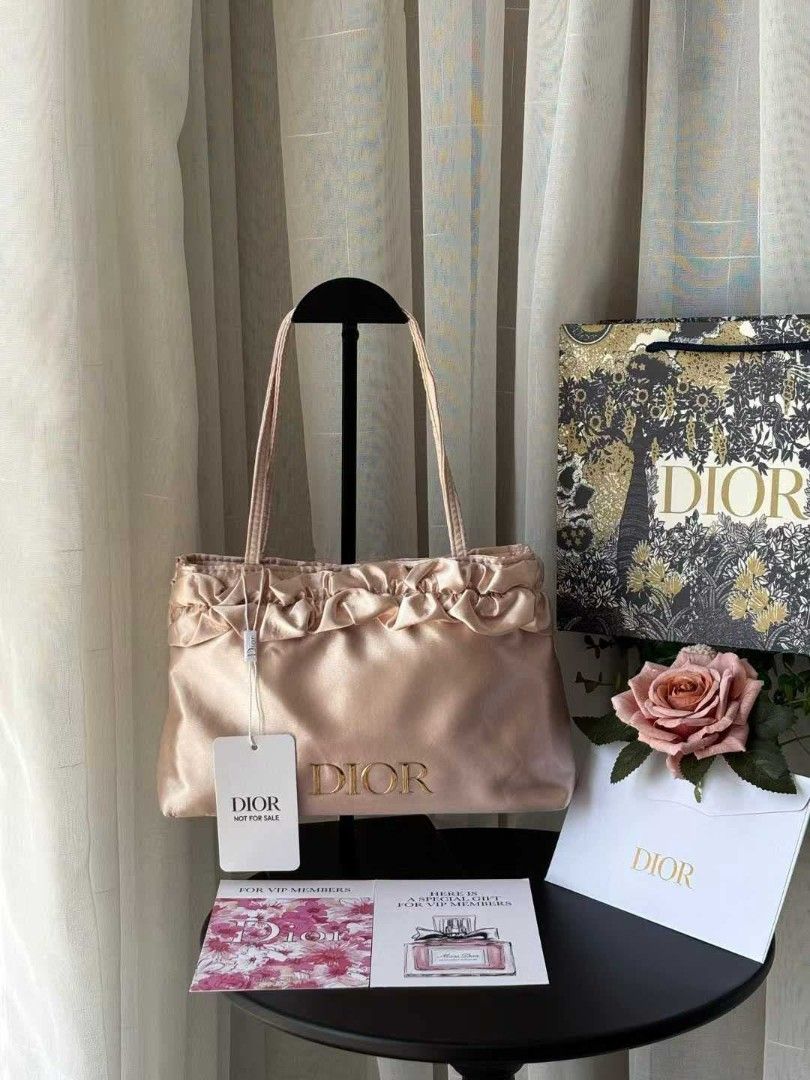 Dior satin Kili bag (Category: Luxury Bags & Wallets) located in Pasig City. Submitted by perfumesrus (Listing ID 1453712838, Image 1). Description: ⚠️ Please Note Before Ordering: This item is a pre-order and ships from overseas. Please allow 1 to 2 weeks for your order to arrive. Thank you for your patience! DISCLAIMER: My page is an independent reseller of authentic products. We are not affiliated, associated, authorized, endorsed by, or in an