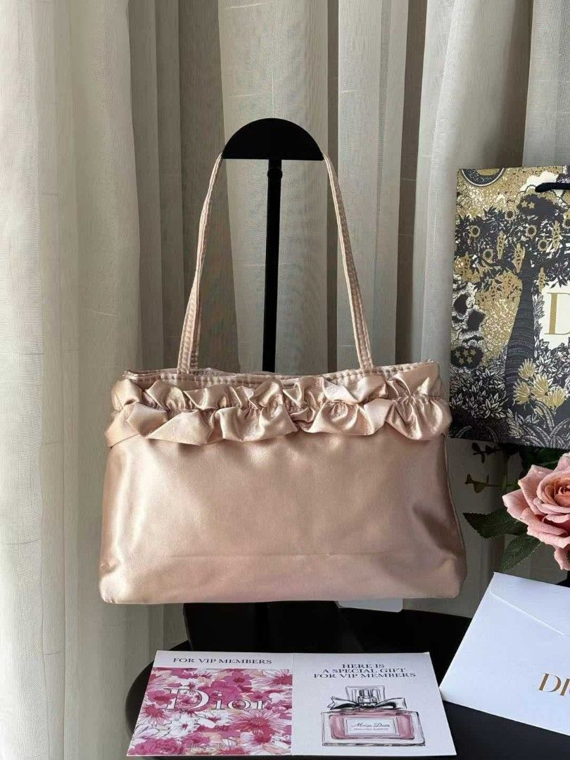 Dior satin Kili bag (Category: Luxury Bags & Wallets) located in Pasig City. Submitted by perfumesrus (Listing ID 1453712838, Image 2). Description: ⚠️ Please Note Before Ordering: This item is a pre-order and ships from overseas. Please allow 1 to 2 weeks for your order to arrive. Thank you for your patience! DISCLAIMER: My page is an independent reseller of authentic products. We are not affiliated, associated, authorized, endorsed by, or in an
