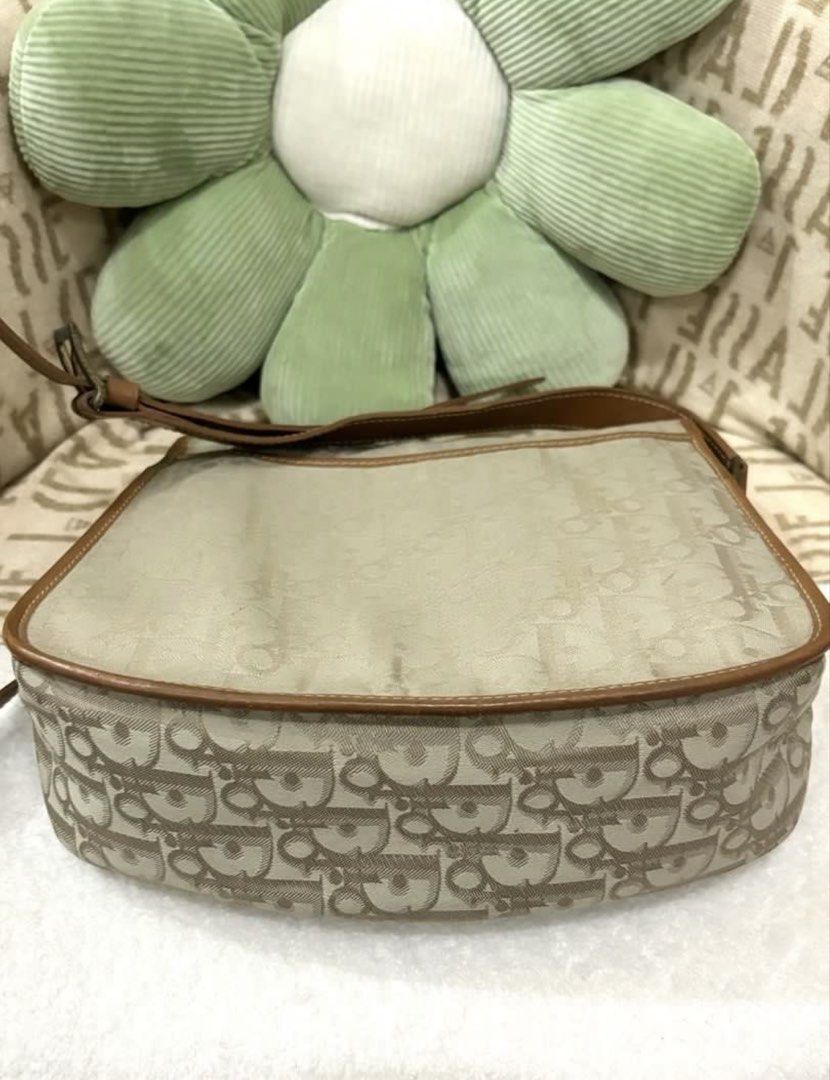Dior Trotter Monogram Crossbody Bag (Category: Luxury Bags & Wallets) located in Iba. Submitted by luxbagsandblings (Listing ID 1453792545, Image 3). Description: 🌸Guaranteed Authentic Christian Dior Trotter Monogram Messenger Bag / Crossbody Bag 💯 (UNISEX BAG✅) -💛 Vintage Piece 💛 -Slightly Negotiable✅ -YKK Zipper -Can fit a lot of items (Notebooks, Ipad Mini, phone, make up, Long Wallet, etc…) -RANK AB - B✨(No major issues, slight cracks on 