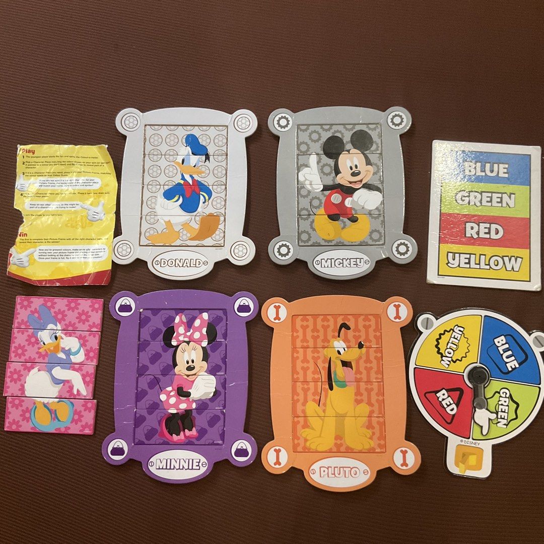Disney Mickey Mouse Color Matching Puzzle Game (Category: Board Games & Puzzles) located in San Miguel. Submitted by ilovesale014 (Listing ID 1453784224, Image 1). Description: - Fun color matching game featuring Mickey Mouse and friends. - Includes character puzzles, color guides, and a spinner. - Perfect for little ones learning colors and matching skills. - missing daisy's frame but still playble. - All pieces are present and accounted for. - 