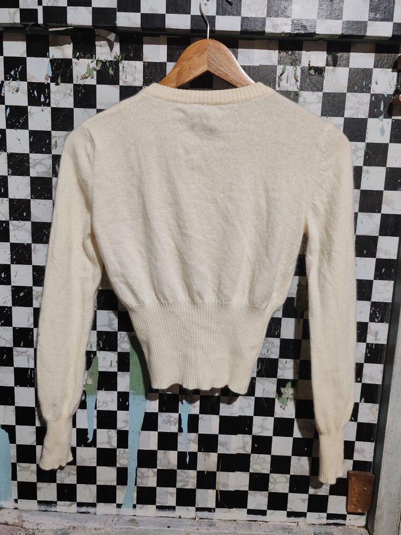 Dolce & gabbana (Category: Luxury Apparel) located in Manila. Submitted by ritzselect26 (Listing ID 1453683777, Image 2). Description: D & G knitted cream cropped cardigan Button down Metal chest logo Size medium on tag Width-19" Lenght-18" Sleeve-23.5" Cut wash tag.