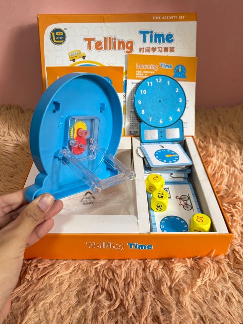 Educational Time Learning Clock Model Activity Set (Category: Educational & Learning Toys) located in Balanga. Submitted by chaiee.btn (Listing ID 1453727373, Image 3). Description: *complete accessories to help kids learn how to read an analog clock *with activity cards and puzzles Please check photos for actual condition. “As is basis”: Buyer accepts all declared, visible and/or unnoticed faults, damage, and/or missing parts, if any, the moment