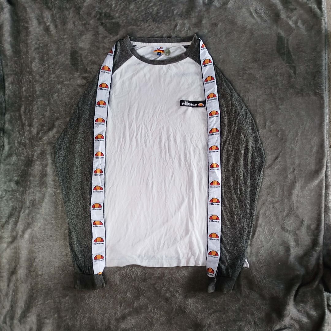 Ellesse sleeve tape (authentic) (Category: Hoodies) located in Cabiao. Submitted by aeclark (Listing ID 1453685496, Image 2). Description: size medium EXELLENT CONDI NO ISSUE 10/10 COLOR RATE NEED WASH ONLY CUT ONE TAG ONLY.