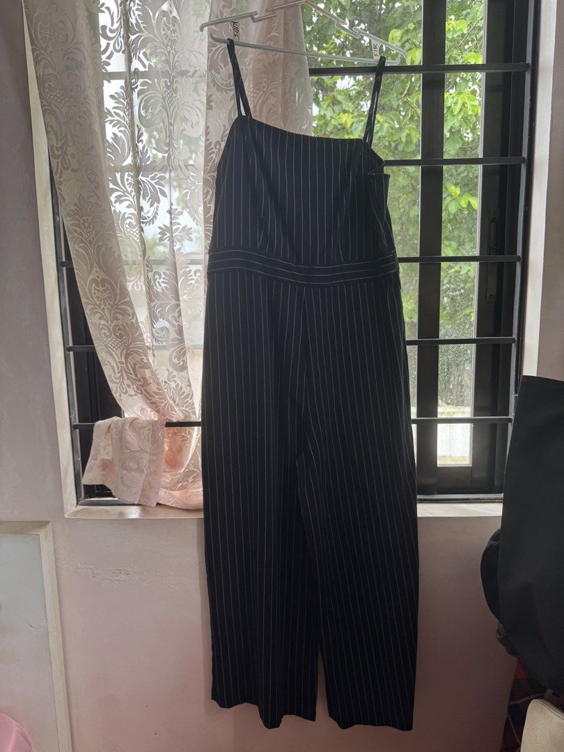 Forever 21 Black and White Stripes Jumpsuit (Category: Jumpsuits) located in Paranaque City. Submitted by danni.nat (Listing ID 1453655466, Image 1). Description: - Comes with adjustable straps - Stretchy comfy material - Length is perfect for 5’2 - 5’3.