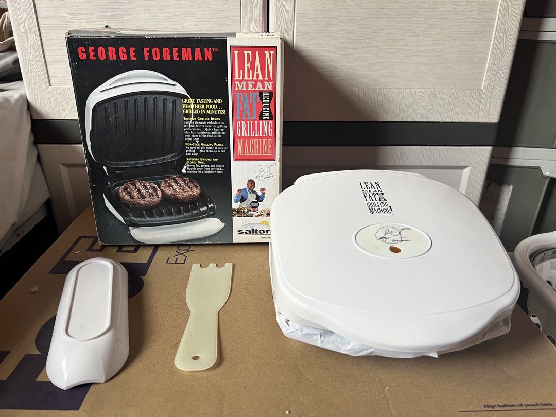 George Foreman Lean Mean Grilling Machine with Accessories (Category: BBQ, Grills & Hotpots) located in Manila. Submitted by vandetoria (Listing ID 1453699607, Image 2). Description: - George Foreman Lean Mean Grilling Machine - Enjoy great taste and healthier food, grilled in minutes - Includes the grill, a drip tray, and a spatula - Original box is included - Perfect for preparing quick and delicious meals.