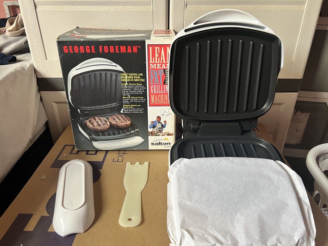 George Foreman Lean Mean Grilling Machine with Accessories (Category: BBQ, Grills & Hotpots) located in Manila. Submitted by vandetoria (Listing ID 1453699607, Image 1). Description: - George Foreman Lean Mean Grilling Machine - Enjoy great taste and healthier food, grilled in minutes - Includes the grill, a drip tray, and a spatula - Original box is included - Perfect for preparing quick and delicious meals.