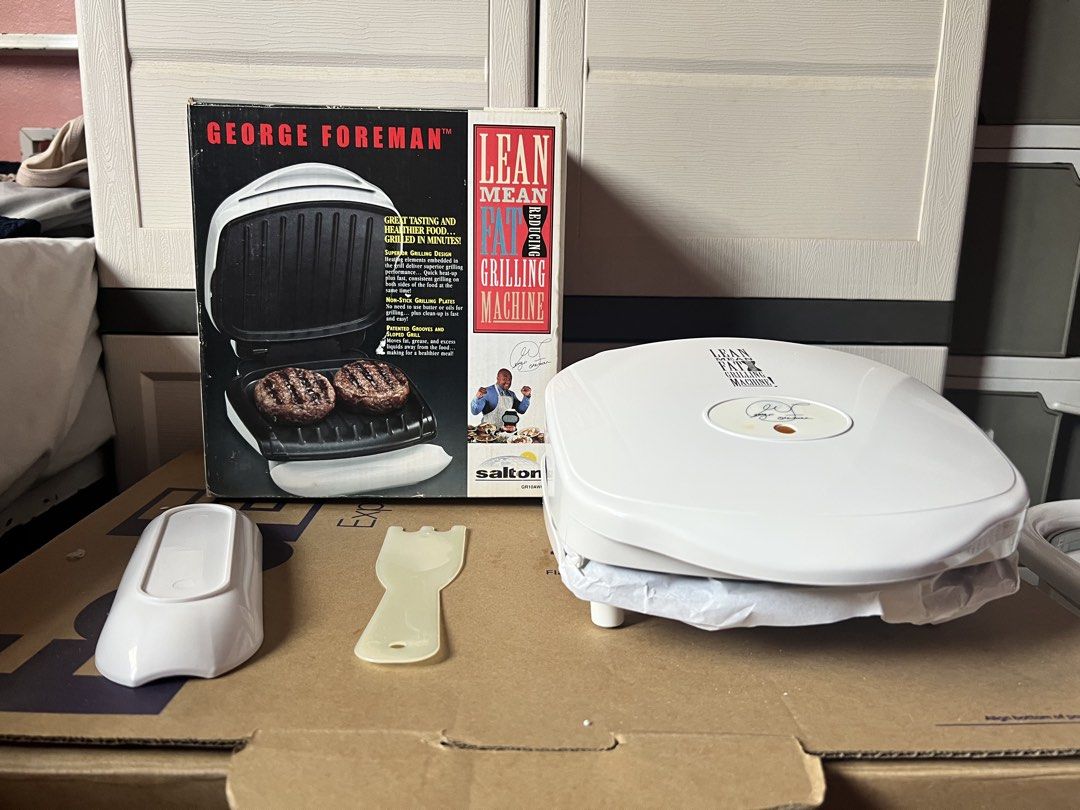 George Foreman Lean Mean Grilling Machine with Accessories (Category: BBQ, Grills & Hotpots) located in Manila. Submitted by vandetoria (Listing ID 1453699607, Image 3). Description: - George Foreman Lean Mean Grilling Machine - Enjoy great taste and healthier food, grilled in minutes - Includes the grill, a drip tray, and a spatula - Original box is included - Perfect for preparing quick and delicious meals.