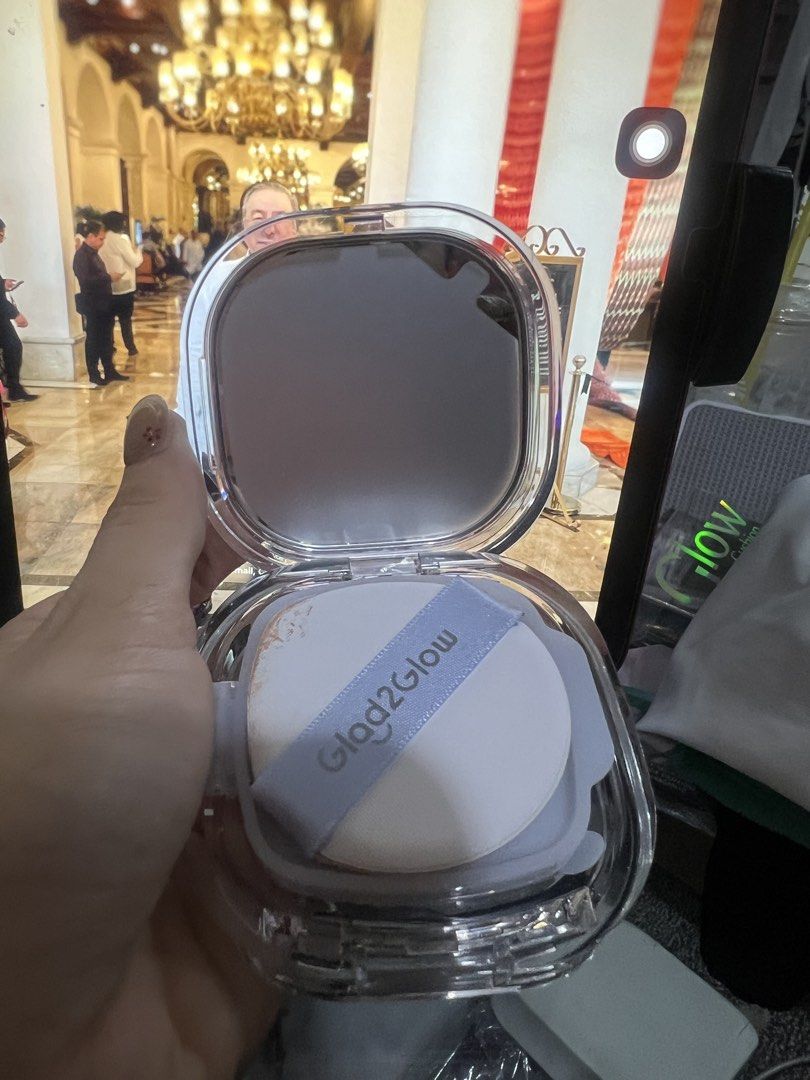 Glad2Glow Cushion Foundation 02 Praline (Category: Makeup) located in Taguig. Submitted by strutstella (Listing ID 1453681753, Image 2). Description: - Glad2Glow Cushion Foundation - Shade: 02 Praline - Comes with a puff - Features a clear compact with a silver mirror finish - Ideal for on-the-go touch-ups - Achieve a radiant, glowy complexion Just watched on skin so puffer is used once na This is not my shade.