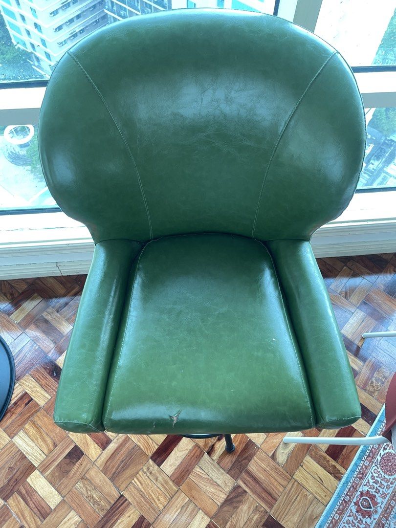 Green Leather Swivel Bar Chair (Category: Chairs) located in Tanza. Submitted by johnmartyntambis (Listing ID 1453629914, Image 2). Description: Green Leather Swivel Bar Chair Slight tear 30” seat height 45” total height Good for vintage/mid century home Pickup location: Meralco Ave., Pasig City.