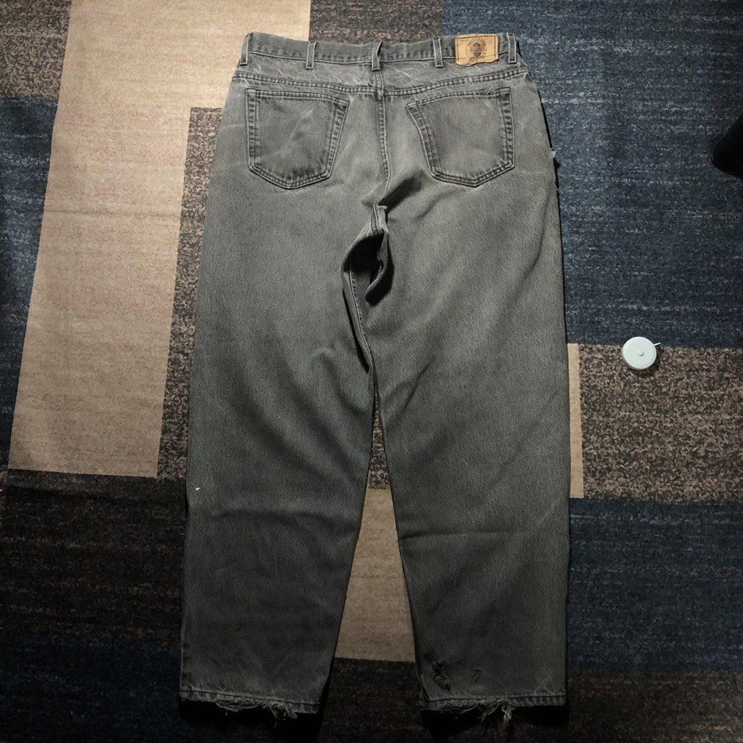 Grey Wash Distressed Denim Jeans (Category: Jeans) located in Dasmarinas. Submitted by johnlloydm99208 (Listing ID 1453732518, Image 2). Description: - Grey wash - Distressed with rips on front and hem - Button fly closure - Staple wardrobe item - Perfect for casual wear.