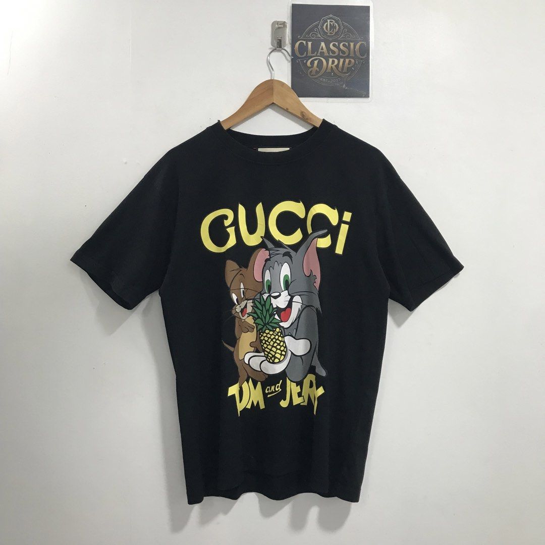 GUCCI X TOM & JERRY (Category: Luxury Apparel) located in Ozamiz City. Submitted by ClassicDrip (Listing ID 1453659833, Image 1). Description: GUCCI x TOM & JERRY 🔥 -AUTHENTIC / LEGIT 💯 -SIZE SMALL OVERSIZED FIT -DIMENSION 22 WIDTH X 29 LENGTH -SUPER SOLID PIECE -GRAPHICS ARE SO CRISPY INTACT.
