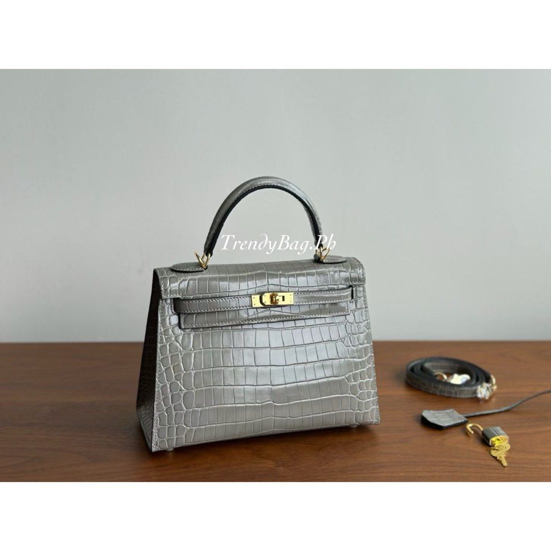 Hermes Kelly 25cm Crocodile Leather Grey (Category: Luxury Bags & Wallets) located in Pasig City. Submitted by trendybag.ph (Listing ID 1453805812, Image 2). Description: Looking for a classy and durable bag? 👜 Our Hand-Stitched Leather Bags feature: ✨ Fine stamp details ✨ Code stamp ✨ Premium quality leather ✨ Stylish and durable Perfect for everyday use or gifting ✨ 🚚 Shipping / Delivery Available 📍 Pick-up Available PM for orders & inquirie