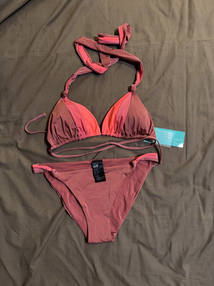 H&M Colorblock Bikini Set (Category: Bikinis & Swimsuits) located in Las Pinas. Submitted by vrache (Listing ID 1453812249, Image 1). Description: - Cute H&M bikini set - Colorblock design in pink and mauve - Halter neck top with adjustable ties - Matching bikini bottoms - Ideal for beach or pool days.