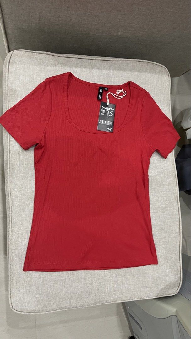 H&M Divided Red Ribbed Square Neck T-shirt (Category: Shirts) located in Angat. Submitted by eltiff (Listing ID 1453749451, Image 3). Description: - Color: Red - Material: Ribbed fabric - Neckline: Square - Size: XS (fit up to 34 bust size) - Condition: Brand new with tags, never worn.
