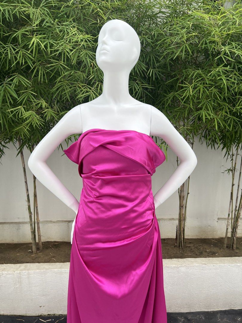 Hot Pink Strapless Ruched Gown (Category: Evening dresses & gowns) located in Quezon City. Submitted by amandasee21 (Listing ID 1453785261, Image 3). Description: - Vibrant hot pink strapless gown - Flattering ruched detail on the side - Fabric with a beautiful sheen - Perfect for formal events or parties - Floor length with a slight train - Guaranteed to turn heads.