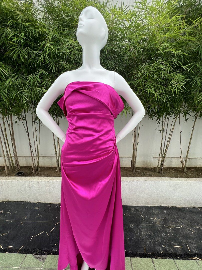 Hot Pink Strapless Ruched Gown (Category: Evening dresses & gowns) located in Quezon City. Submitted by amandasee21 (Listing ID 1453785261, Image 2). Description: - Vibrant hot pink strapless gown - Flattering ruched detail on the side - Fabric with a beautiful sheen - Perfect for formal events or parties - Floor length with a slight train - Guaranteed to turn heads.