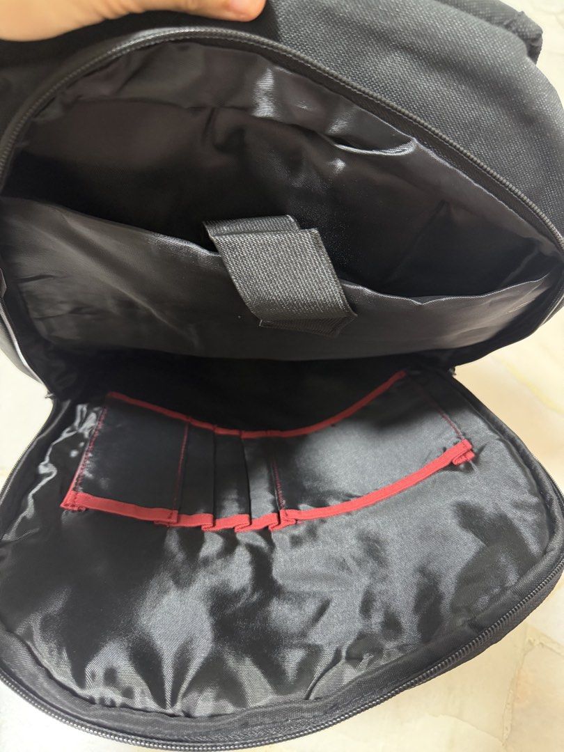 HP Backpack (Category: Backpacks) located in Singapore. Submitted by crazydino__ (Listing ID 1453767136, Image 3). Description: Clean, well-maintained, and perfect for carrying a laptop, books, and other daily essentials. Features: - Padded laptop compartment for added protection - Multiple compartments for easy organization - Comfortable adjustable shoulder straps - Durable and lightweight design - Suitable for work, school, or travel - Conditio