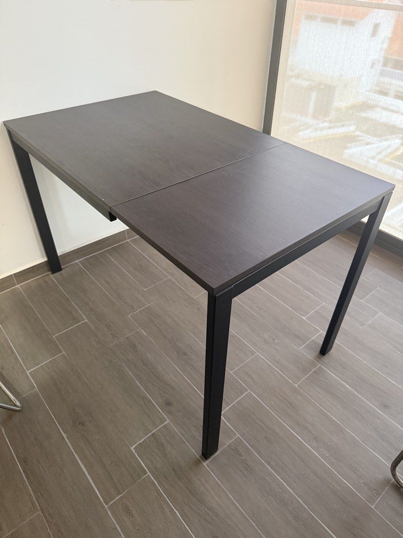 IKEA extendable table (Category: Tables & Sets) located in Singapore. Submitted by ben08p (Listing ID 1453676745, Image 2). Description: IKEA extendable table. Easy to extend from 4 seater to 6 seater. Must sell by end August. Please arrange your own pick up and transport. .