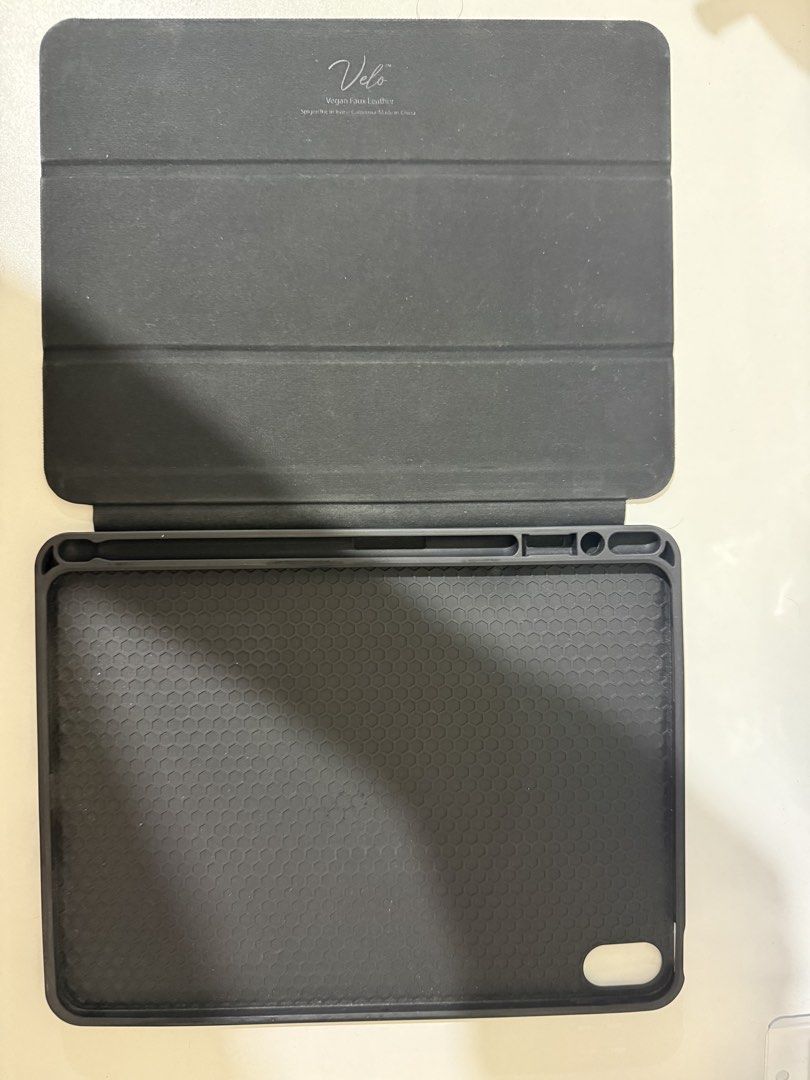 iPad Air Case SPIGEN (Category: Cases & Sleeves) located in Manila. Submitted by CB2023 (Listing ID 1453733306, Image 2). Description: The case is compatible with the latest iPad Air (8th generation), although it was originally released for the 7th generation. I never actually used it because of my Apple Pencil. The pencil holder is located on the opposite side, away from the magnetic charging area, making it inconvenient to charge the Apple Penc