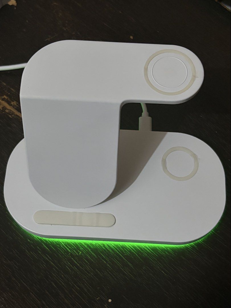 ITFIT 3-in-1 LED Wireless Charger (Category: Chargers & Cables) located in Quezon City. Submitted by ekdcr_ (Listing ID 1453709875, Image 2). Description: - can charge a phone, watch, and earbuds all at once - comes with the box, a 30W travel adapter, and type c cord - has a green LED light at the base to show it's powered on - negotiable! :).