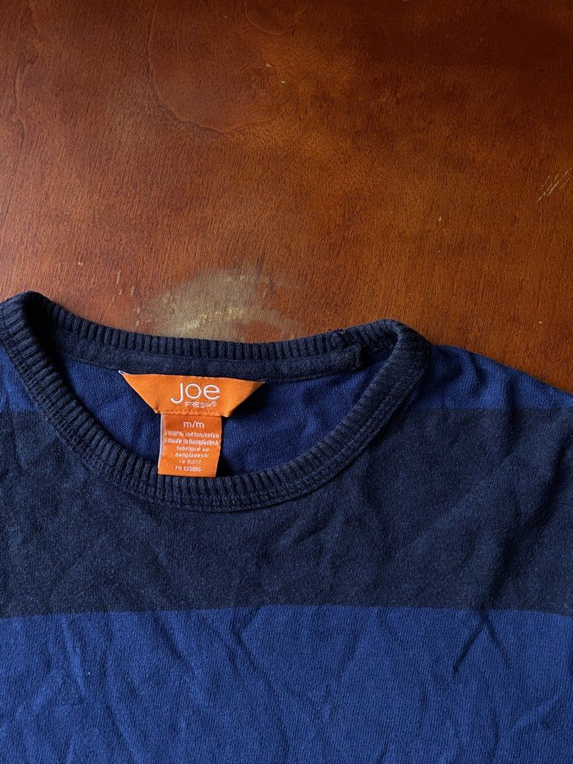 Joe Fresh Long Sleeves M/L (Category: Formal Shirts) located in Mandaluyong City. Submitted by champ4gnepapi (Listing ID 1453812620, Image 1). Description: Joe Fresh Long Sleeve Shirt: - Size: M on tag could fit L - Material: 100% Cotton - Color: Blue - bought in Canada, never worn. .
