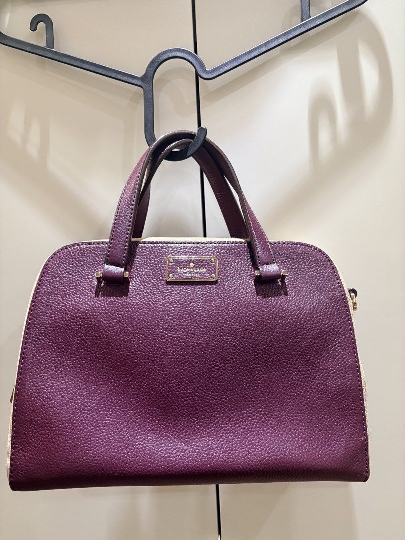Kate Spade Pebbled Leather Satchel Handbag (Category: Luxury Bags & Wallets) located in Mandaluyong City. Submitted by mariegeronimo (Listing ID 1453681161, Image 1). Description: Kate Spade Kay Street Small Felix Satchel - Classic Kate Spade satchel - Deep plum pebbled leather with cream accents - Gold hardware details - Top handles for carrying - Spacious interior for essentials - Timeless and perfect for everyday use Length (Width): 11.0 inche