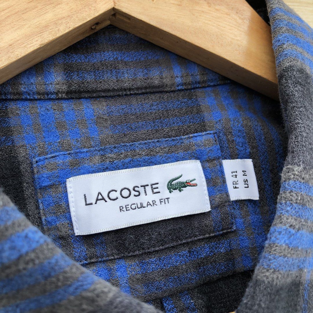 Lacoste Polo Long sleeves button down (Category: Formal Shirts) located in Cavite. Submitted by nicepicker (Listing ID 1453784686, Image 3). Description: Size on Tag: Medium Dimension: 22 x 29 Condition: 9/10 Flaws: None.